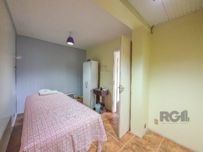 Casa à venda com 255m², 3 quartos, 1 suíte, 4 vagas no bairro Chácara das Pedras em Porto Alegre - Foto 34