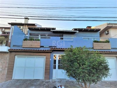 Casa à venda com 176m², 3 quartos, 1 suíte, 2 vagas no bairro Jardim Itu em Porto Alegre - Foto 14