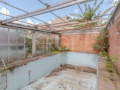 Casa à venda com 220m², 3 quartos, 2 vagas no bairro Petrópolis em Porto Alegre - Foto 13