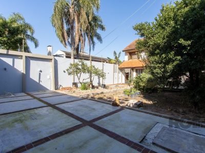 Casa à venda com 279m², 3 quartos, 1 suíte, 2 vagas no bairro Tristeza em Porto Alegre - Foto 24