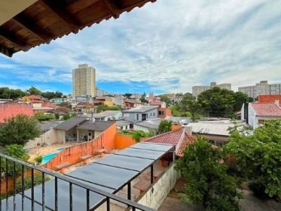 Casa à venda com 310m², 3 quartos, 1 suíte, 2 vagas no bairro Santo Antônio em Porto Alegre - Foto 29