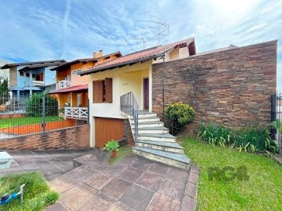 Casa à venda com 310m², 3 quartos, 1 suíte, 2 vagas no bairro Santo Antônio em Porto Alegre - Foto 45