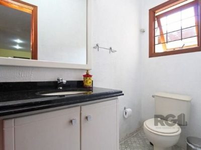 Casa à venda com 310m², 3 quartos, 1 suíte, 2 vagas no bairro Santo Antônio em Porto Alegre - Foto 14