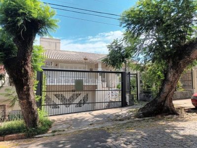 Casa à venda com 324m², 4 quartos, 2 suítes, 2 vagas no bairro Três Figueiras em Porto Alegre - Foto 23