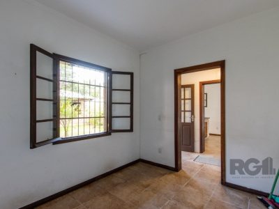 Casa à venda com 267m², 4 quartos, 1 suíte, 4 vagas no bairro Ipanema em Porto Alegre - Foto 17