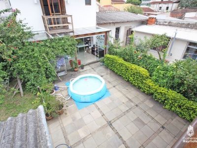 Casa à venda com 151m², 3 quartos, 1 suíte, 2 vagas no bairro Partenon em Porto Alegre - Foto 28