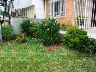 Casa à venda com 150m², 3 quartos, 1 suíte, 4 vagas no bairro Partenon em Porto Alegre - Foto 15