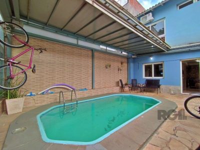 Casa à venda com 233m², 4 quartos, 1 suíte, 3 vagas no bairro Partenon em Porto Alegre - Foto 31