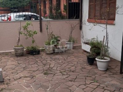 Casa à venda com 210m², 4 quartos, 2 vagas no bairro Petrópolis em Porto Alegre - Foto 6