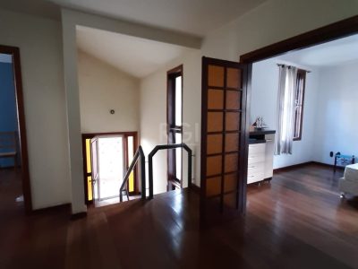 Casa à venda com 262m², 3 quartos, 1 suíte, 6 vagas no bairro Auxiliadora em Porto Alegre - Foto 15