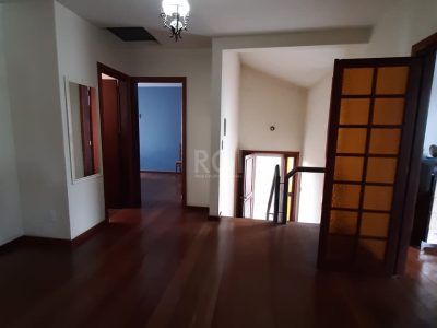 Casa à venda com 262m², 3 quartos, 1 suíte, 6 vagas no bairro Auxiliadora em Porto Alegre - Foto 16