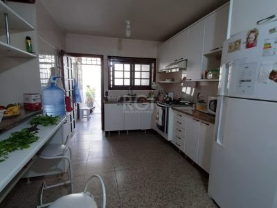 Casa à venda com 262m², 3 quartos, 1 suíte, 6 vagas no bairro Auxiliadora em Porto Alegre - Foto 19