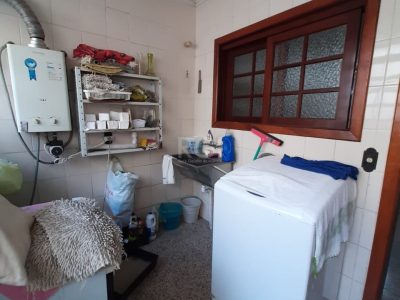 Casa à venda com 262m², 3 quartos, 1 suíte, 6 vagas no bairro Auxiliadora em Porto Alegre - Foto 22