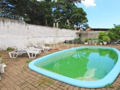 Casa à venda com 468m², 5 quartos no bairro Medianeira em Porto Alegre - Foto 25