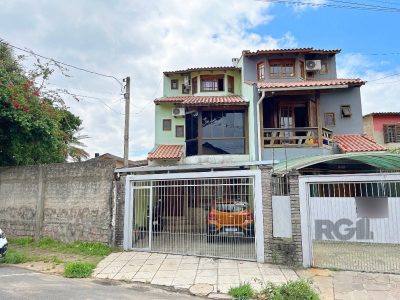 Sobrado à venda com 218m², 4 quartos, 3 suítes, 2 vagas no bairro Ipanema em Porto Alegre - Foto 2