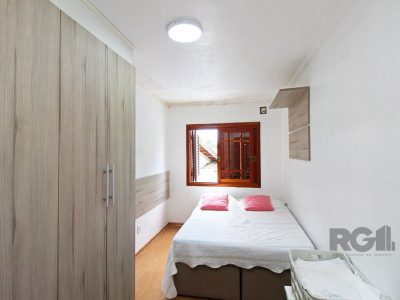 Sobrado à venda com 218m², 4 quartos, 3 suítes, 2 vagas no bairro Ipanema em Porto Alegre - Foto 25