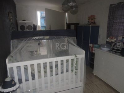 Casa à venda com 112m², 3 quartos, 1 suíte, 2 vagas no bairro Partenon em Porto Alegre - Foto 13