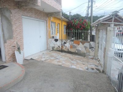 Casa à venda com 112m², 3 quartos, 1 suíte, 2 vagas no bairro Partenon em Porto Alegre - Foto 14