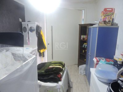 Casa à venda com 112m², 3 quartos, 1 suíte, 2 vagas no bairro Partenon em Porto Alegre - Foto 16