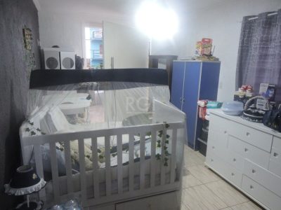 Casa à venda com 112m², 3 quartos, 1 suíte, 2 vagas no bairro Partenon em Porto Alegre - Foto 28