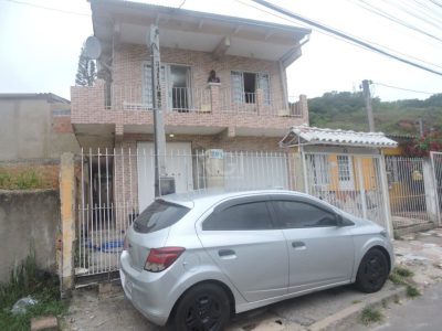 Casa à venda com 112m², 3 quartos, 1 suíte, 2 vagas no bairro Partenon em Porto Alegre - Foto 44