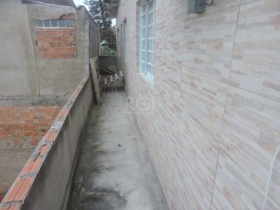 Casa à venda com 112m², 3 quartos, 1 suíte, 2 vagas no bairro Partenon em Porto Alegre - Foto 45