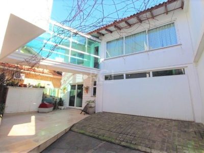 Casa à venda com 317m², 3 quartos, 3 suítes, 4 vagas no bairro Jardim Lindóia em Porto Alegre - Foto 35