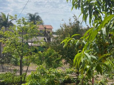 Casa à venda com 230m², 3 quartos, 1 suíte, 4 vagas no bairro Santa Tereza em Porto Alegre - Foto 9