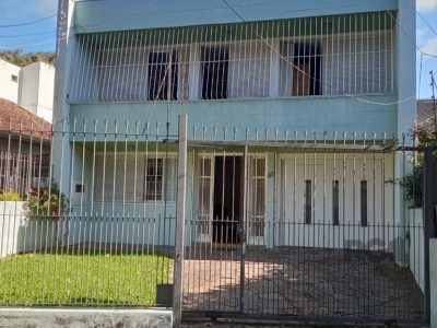 Casa à venda com 330m², 4 quartos, 1 suíte, 3 vagas no bairro Santo Antônio em Porto Alegre - Foto 26