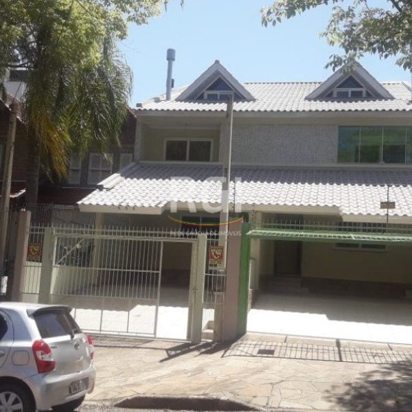 Sobrado à venda com 245m², 4 quartos, 1 suíte, 3 vagas no bairro Jardim Itu em Porto Alegre - Foto 1