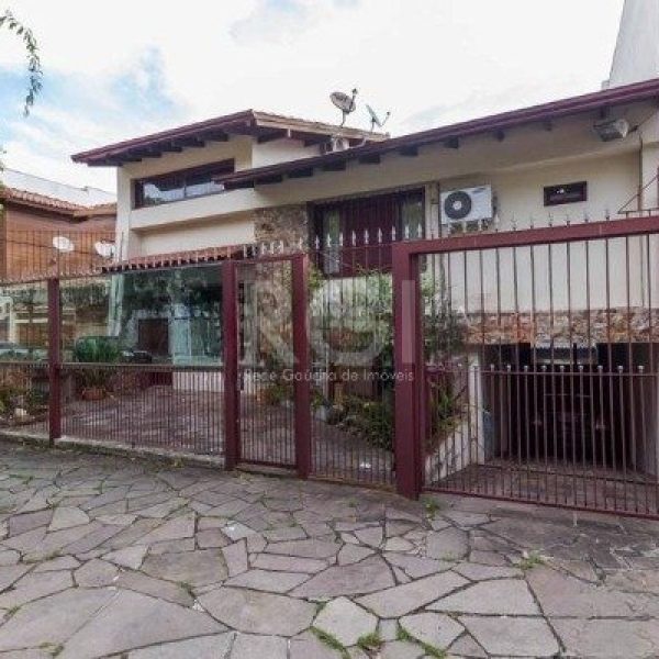 Casa à venda com 396m², 4 quartos, 2 suítes, 6 vagas no bairro Chácara das Pedras em Porto Alegre - Foto 1