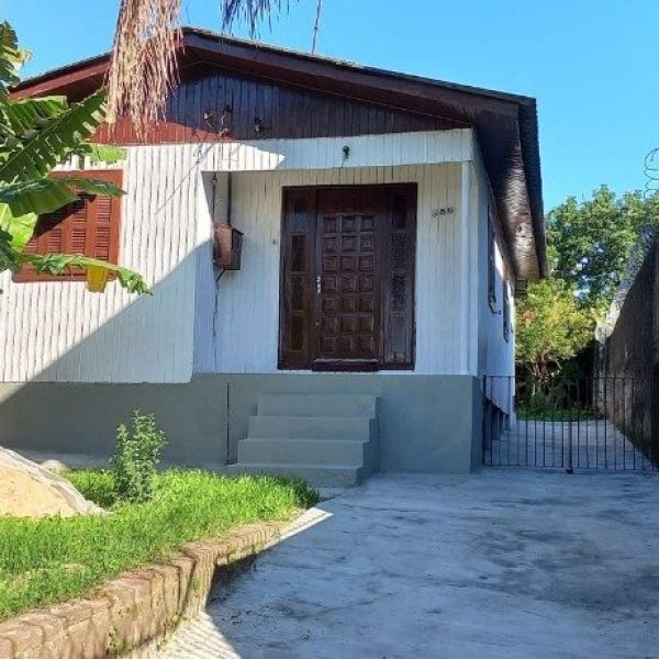 Casa à venda com 57m², 2 quartos, 1 vaga no bairro Jardim Itu em Porto Alegre - Foto 1