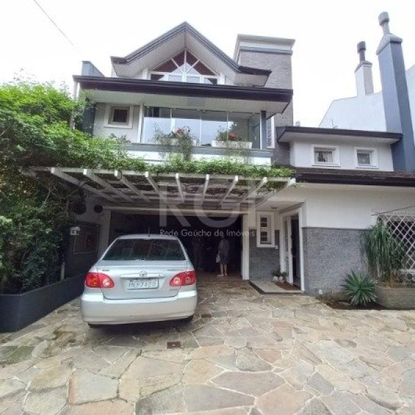 Casa à venda com 283m², 4 quartos, 2 suítes, 4 vagas no bairro Santa Tereza em Porto Alegre - Foto 1