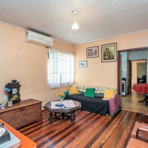 Casa à venda com 125m², 3 quartos, 1 suíte, 2 vagas no bairro Jardim do Salso em Porto Alegre - Foto 1