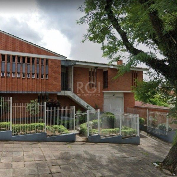 Casa à venda com 350m², 3 quartos, 2 suítes, 5 vagas no bairro Santo Antônio em Porto Alegre - Foto 1