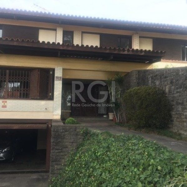 Casa à venda com 406m², 3 quartos, 1 suíte, 4 vagas no bairro Três Figueiras em Porto Alegre - Foto 1