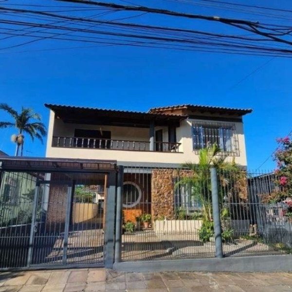 Casa à venda com 347m², 5 quartos, 3 suítes, 1 vaga no bairro Jardim Itu em Porto Alegre - Foto 1