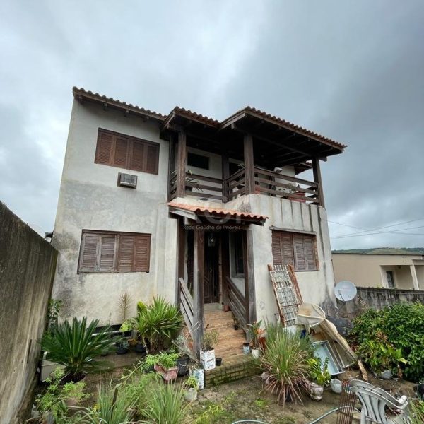 Casa à venda com 400m², 6 quartos, 1 suíte, 4 vagas no bairro Partenon em Porto Alegre - Foto 1