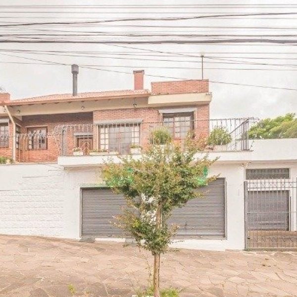 Casa à venda com 440m², 3 quartos, 1 suíte, 2 vagas no bairro Santa Tereza em Porto Alegre - Foto 1