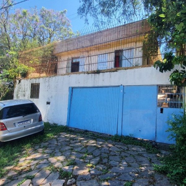 Casa à venda com 200m², 5 quartos, 1 suíte, 4 vagas no bairro Santa Tereza em Porto Alegre - Foto 1