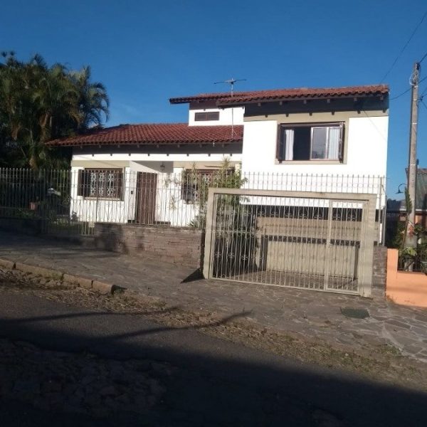 Casa à venda com 336m², 4 quartos, 2 suítes, 4 vagas no bairro Partenon em Porto Alegre - Foto 1