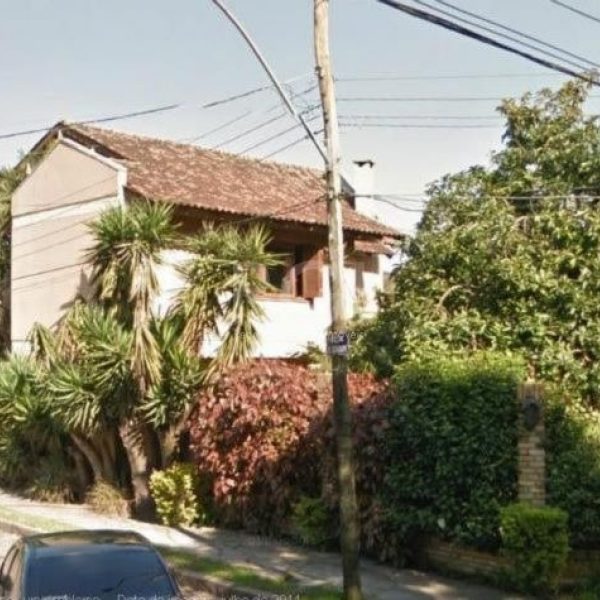 Casa à venda com 350m², 3 quartos, 1 suíte, 6 vagas no bairro Tristeza em Porto Alegre - Foto 1